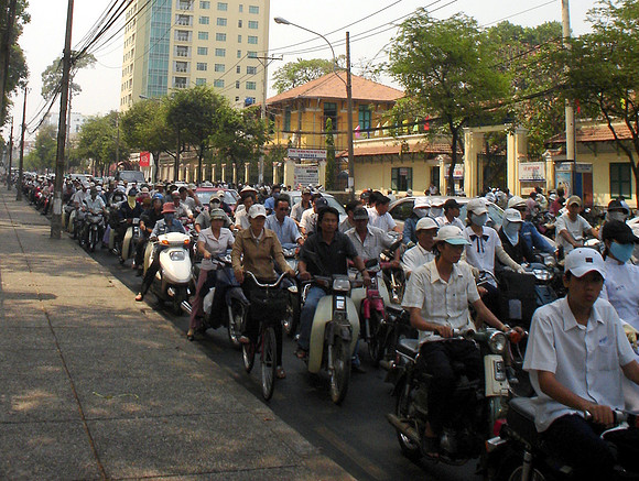 Motorcycle traffic, Ho Chi Minh City (Saigon) - Vietnam.
