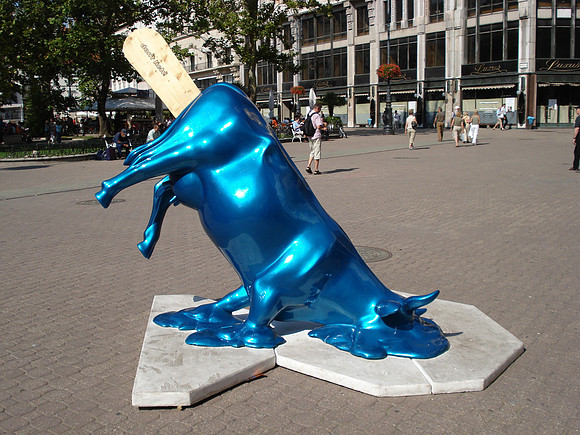 Blue melting ice cream cow at Cow Parade – Budapest