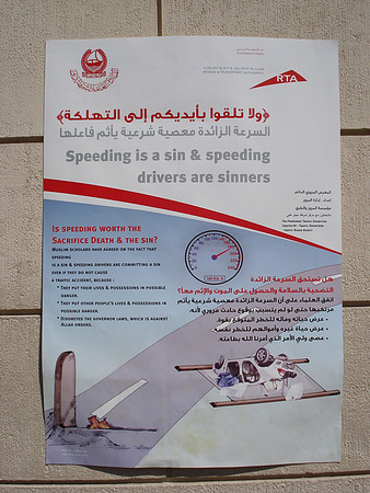 Government poster: "Speeding is a sin and speeding drivers are sinners". Dubai - UAE.